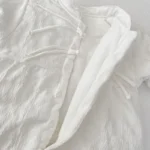 Combinaison pour bébé d'hiver matelassée blanche – Image 4